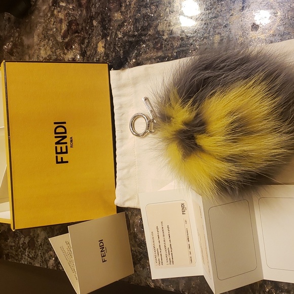Fendi Handbags - Fendi charm pom pom